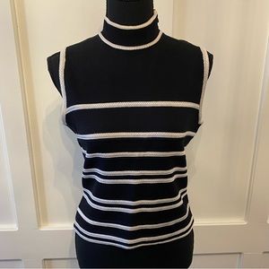 St. John knit sleeveless top with a mock turtleneck